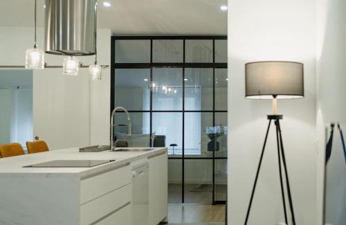 Lugo Appartement | Ático Isabel, diseño y calidez junto a la Muralla Romana
