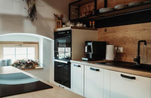 Smizany Appartement | ČÁKYHO KÚRIA - mezonetový apartmán s krbom a saunami