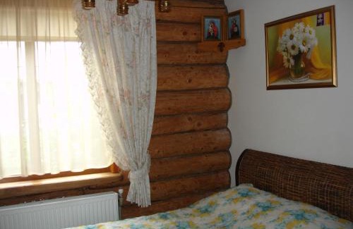 Pochaiv Maison | Смерекова хата