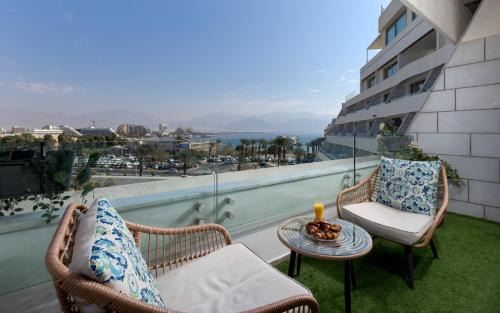 Eilat Appartement | דירה מעוצבת עם נוף מטריף לים במתחם סי סייד - Edomlux