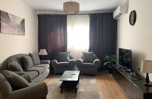 Al Duqqi Appartement | شقة فندقية بشارع جامعة الدول العربية