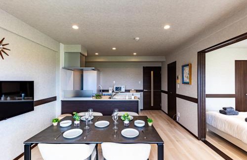 Yonabaru Appartement | 海の見える高層階グループファミリー歓迎コストコ近くThe琉球タワー9A