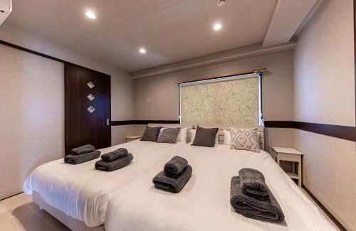Yonabaru Appartement | 海の見える高層階グループファミリー歓迎コストコ近くThe琉球タワー9A