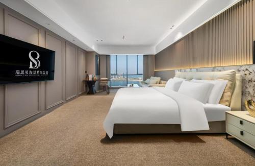 Chikan District Hôtel | 瑞思贝海景精品公寓