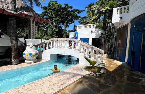Galu Beach Villa | A sentimental villa with a swimmingpool near beach