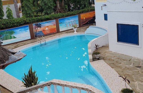 Galu Beach Villa | A sentimental villa with a swimmingpool near beach