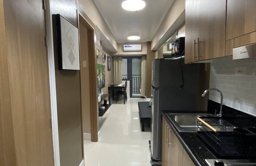 Barangay 76 Copropriété | 1 BR Fully Furnished Condo across MOA with Pool and Parking - Shore3 Unit 1144