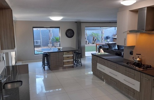 Eikenbosch Maison | 10-12 Sleeper large family home with pool in Bellville, Cape Town