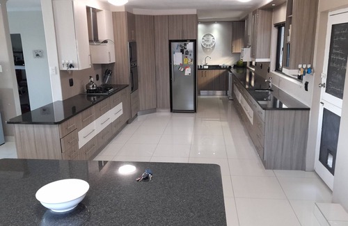 Eikenbosch Maison | 10-12 Sleeper large family home with pool in Bellville, Cape Town