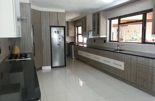 Eikenbosch Maison | 10-12 Sleeper large family home with pool in Bellville, Cape Town