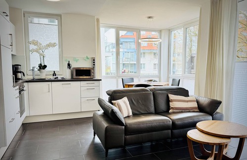 Grossenbrode Appartement | 100 m de la plage Sauna | Cheminée | Jacuzzi | WLAN | Blanchisserie | chaise de plage