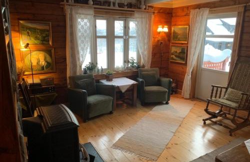 Kvaloya Maison | 100 Years Old Norwegian Log House in Tromsø