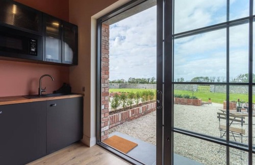 Roscoe Cottage | 19th century restored Irish stable by the lake