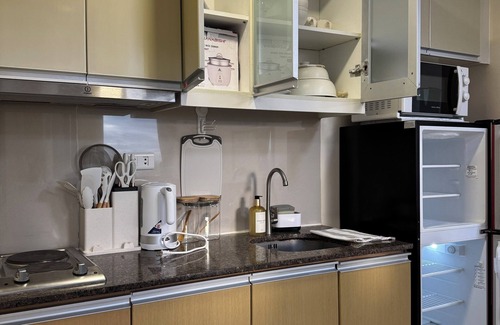 Pinagsama Copropriété | 1BR Condo w/ Great View Near Venice Canal & BGC