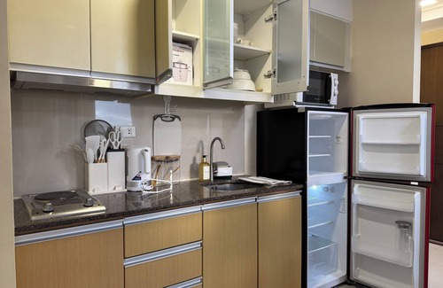 Pinagsama Copropriété | 1BR Condo w/ Great View Near Venice Canal & BGC