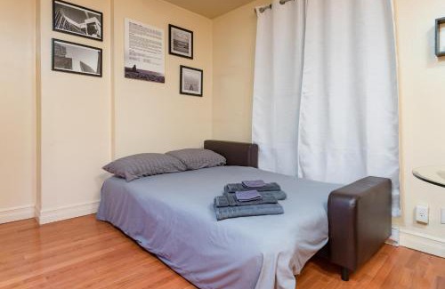 Theatre District Appartement | 1BR in the Heart of Downtown Boston Famous Nightlife Theater District with Bed Full of Promises TD Garden Common Park MBTA