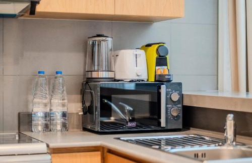 Sharjah Appartement | 1BR The Golden Souq by Blue Cloud Holidays