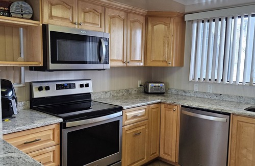 Bethune Beach Copropriété | 1st floor with river view. Across the street from the beach.