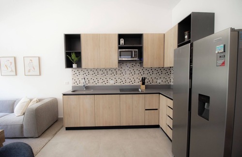 Tambor Copropriété | 2-bedroom condo in Blue Zone with direct beach access.