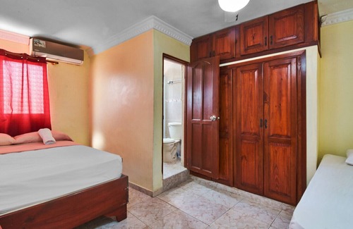 Corales del Sur Hôtel | Appartement d'une chambre amélioré avec balcon cuisine complète à Santo Domingo Este - Grande terrasse d'appartement 2B / 2B, vue sur la ville à Santo Domingo Este