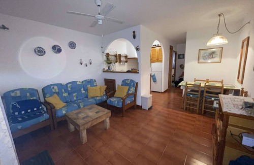 Arenal d'en Castell Appartement | Appartement avec piscine, jardins partagés et vue sur mer