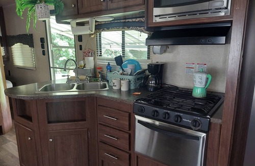 Aguadilla Maison | 2 bedroom camper, minutes from Aguadilla & Isabela beaches with AC and comfort.