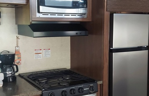 Aguadilla Maison | 2 bedroom camper, minutes from Aguadilla & Isabela beaches with AC and comfort.