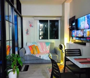 CSJDM Appartement | 2 BEDROOM CONDO close to SM Tungko BULACAN ideal for Family Queen bed on Bedroom 1 accessible to Bedroom 2 with sliding doors Free Wifi & Netflix to watch in a comfy sofa & twin bed Access to SWIMMING POOL entry is very affordable and kids get for free