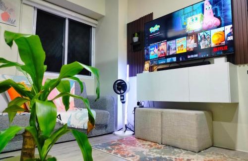 CSJDM Appartement | 2 BEDROOM CONDO close to SM Tungko BULACAN ideal for Family Queen bed on Bedroom 1 accessible to Bedroom 2 with sliding doors Free Wifi & Netflix to watch in a comfy sofa & twin bed Access to SWIMMING POOL entry is very affordable and kids get for free