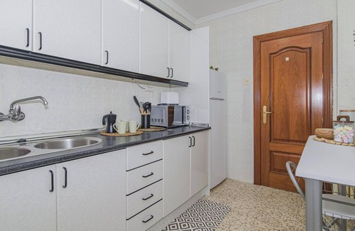 Chana Appartement | 2-Bedroom Retreat with Terrace in Granada - Steps from Metro and Bus