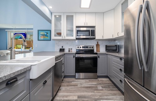 New Smyrna Beach Maison | 2 bedroom, Updated Townhome, in Golf Course neighborhood Sugar Mill