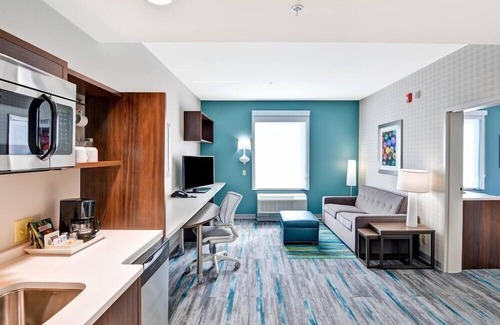 Conway Appartement | 2 Connecting Suites with Two Beds and Two Sofabeds at a Full Service Hotel by Suiteness