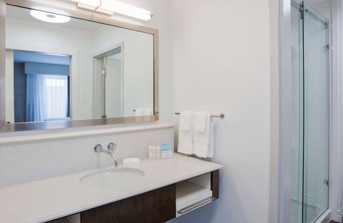 Sioux City Maison | 2 Connecting Suites with Two Beds and Two Sofabeds at a Full Service Hotel by Suiteness