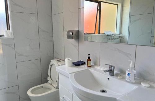 Kawaha Point Appartement | 2 Double Beds, 1 Single Bed, 1 Double Sofa Bed in a small 1 bedroom and 1 lounge Studio No Kitchen Only fridge, microwave