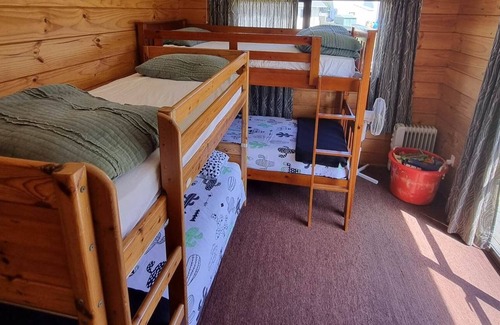 Otaki Beach Maison | 2 minutes from the beach - relax at a Kiwi Family Bach!