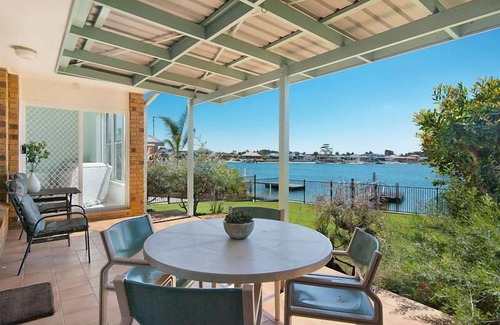 Yamba Maison | 21 MELALEUCA DRIVE, Waterfront with private boat ramp and pontoon -Pet Friendly