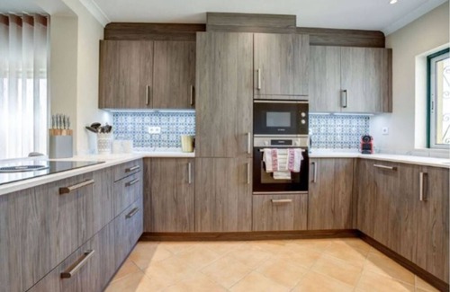 Estombar Maison | Appartement de luxe sur terrain de golf - Climatisation - Wifi - Piscine chauffée - Terrasse - Jardin