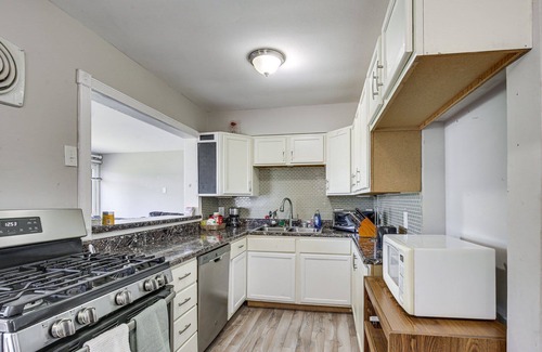 Airport Township Maison | 2BR Retreat with Fire Pit Close To Downtown STL