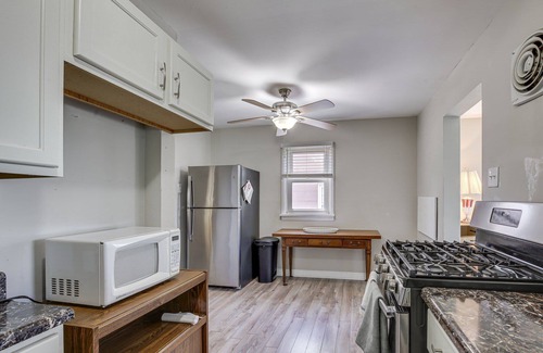 Airport Township Maison | 2BR Retreat with Fire Pit Close To Downtown STL