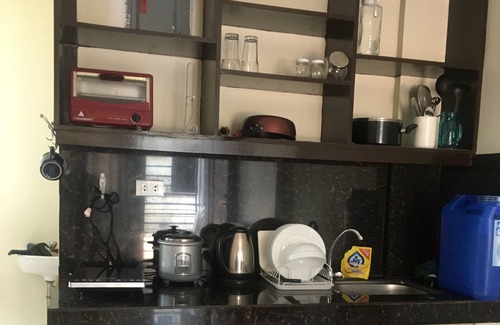Concepcion Appartement | Immeuble de 2 étages Condotel avec 2 chambres, cuisinette, terrasse et stationnement