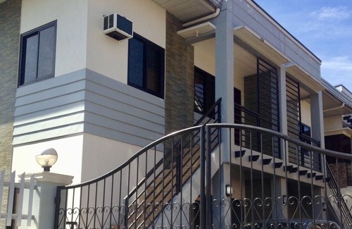Concepcion Appartement | Immeuble de 2 étages Condotel avec 2 chambres, cuisinette, terrasse et stationnement