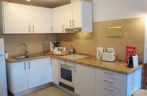 Benitachell Maison | Appartement de 3 chambres, 2 salles de bains, petite terrasse, piscine commune