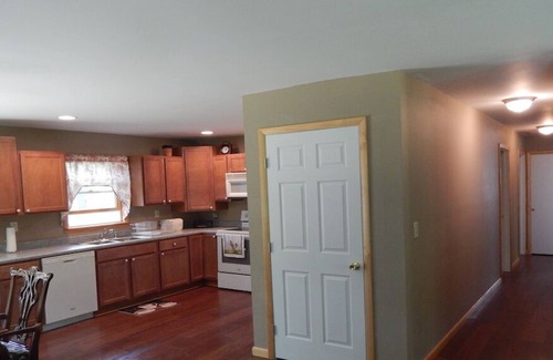 Delancey Maison | 3 Bedroom home with rear deck and covered front porch.