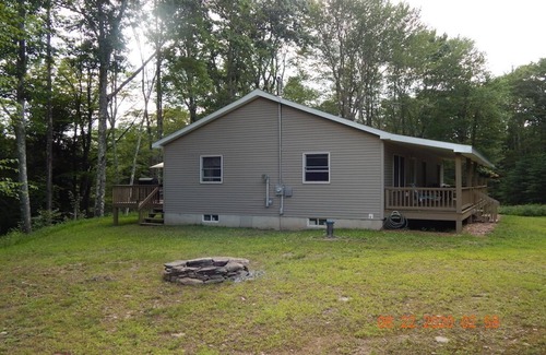 Delancey Maison | 3 Bedroom home with rear deck and covered front porch.