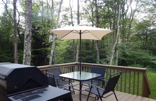 Delancey Maison | 3 Bedroom home with rear deck and covered front porch.