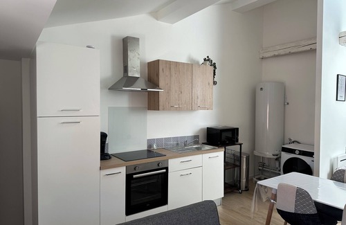 Sauxillanges Appartement | 4-bed family apartment with hanging net and arcade terminal