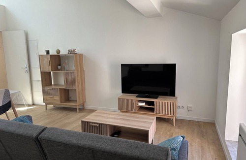Sauxillanges Appartement | 4-bed family apartment with hanging net and arcade terminal