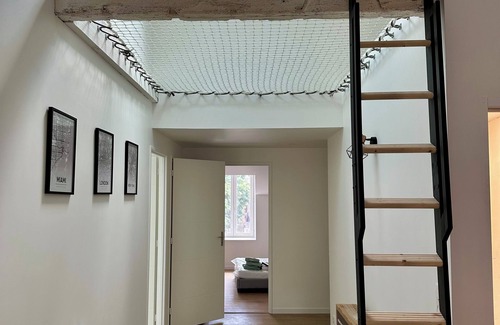 Sauxillanges Appartement | 4-bed family apartment with hanging net and arcade terminal