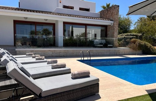 San Antonio Bay Villa | 4 bedroom villa, 3 bath with private pool, sea view and enclosed gardens.