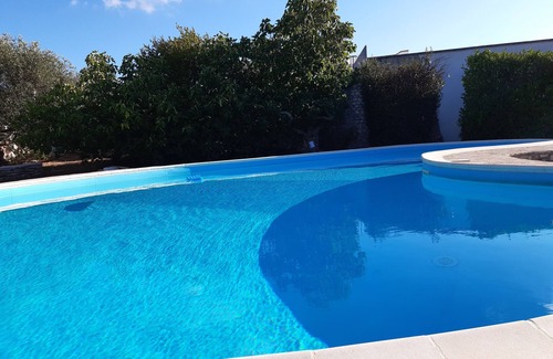Cisternino Appartement | 15% de réduction! 4 personnes, 1er étage, terrasse commune de 9 mètres, piscine et tennis